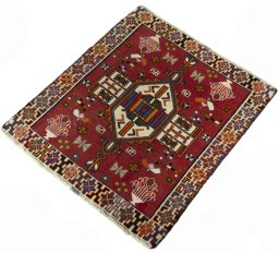 Corner detail of 2000s Shiraz rug showing border pattern and Wool pile