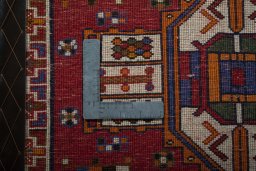 Backside of handmade 2000s Shiraz rug showing knot structure and weave density
