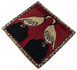 Corner detail of 2000s Shiraz rug showing border pattern and Wool pile