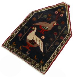 Corner detail of 2000s Shiraz rug showing border pattern and Wool pile