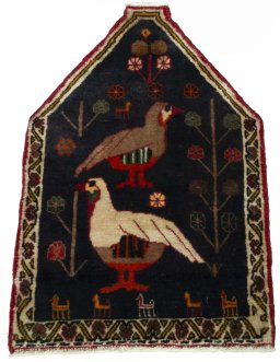 Surface texture of 2000s Shiraz rug with natural Wool and intricate pattern