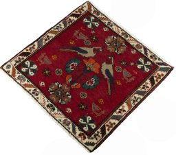 Corner detail of 2000s Shiraz rug showing border pattern and Wool pile