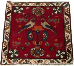 Surface texture of 2000s Shiraz rug with natural Wool and intricate pattern