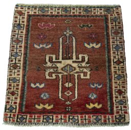 Surface texture of 2000s Shiraz rug with natural Wool and intricate pattern