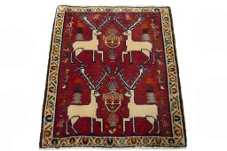 Surface texture of 2000s Shiraz rug with natural Wool and intricate pattern
