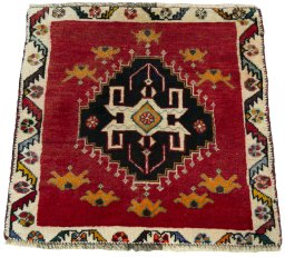 Surface texture of 2000s Shiraz rug with natural Wool and intricate pattern