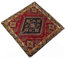 Corner detail of 2000s Shiraz rug showing border pattern and Wool pile