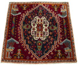 Surface texture of 2000s Shiraz rug with natural Wool and intricate pattern