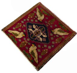 Corner detail of 2000s Shiraz rug showing border pattern and Wool pile