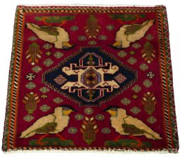 Surface texture of 2000s Shiraz rug with natural Wool and intricate pattern