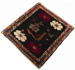Corner detail of 2000s Shiraz rug showing border pattern and Wool pile