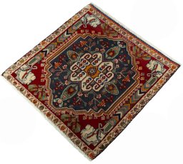 Corner detail of 2000s Shiraz rug showing border pattern and Wool pile