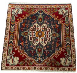 Surface texture of 2000s Shiraz rug with natural Wool and intricate pattern