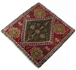 Corner detail of 2000s Shiraz rug showing border pattern and Wool pile