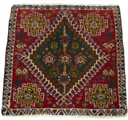 Surface texture of 2000s Shiraz rug with natural Wool and intricate pattern