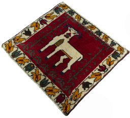 Corner detail of 2000s Shiraz rug showing border pattern and Wool pile