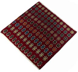 Corner detail of 2000s Shiraz rug showing border pattern and Wool pile