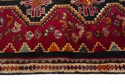Close-up detail of 2000s Shiraz rug from Iran / Persia showing Wool weave