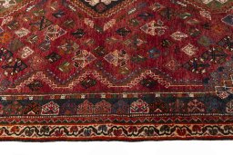 Close-up detail of 2000s Shiraz rug from Iran / Persia showing Wool weave