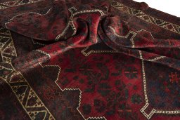 Corner detail of 2000s Shiraz rug showing border pattern and Wool pile