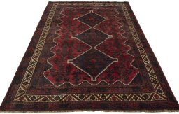 Surface texture of 2000s Shiraz rug with natural Wool and intricate pattern