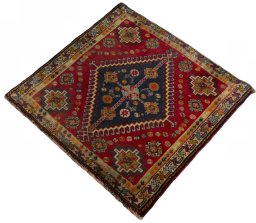 Corner detail of 2000s Shiraz rug showing border pattern and Wool pile