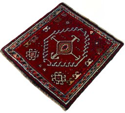 Corner detail of 2000s Shiraz rug showing border pattern and Wool pile