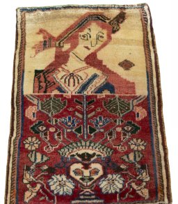 Surface texture of 2000s Shiraz rug with natural Wool and intricate pattern