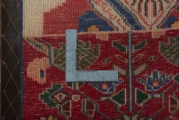 Backside of handmade 2000s Shiraz rug showing knot structure and weave density