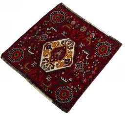 Corner detail of 2000s Shiraz rug showing border pattern and Wool pile