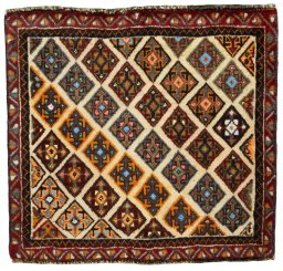 Full view of 2000s Shiraz rug from Iran / Persia, 55 × 60 cm in Red tones