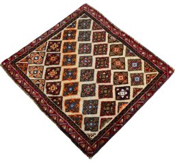 Corner detail of 2000s Shiraz rug showing border pattern and Wool pile