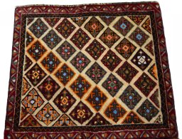 Surface texture of 2000s Shiraz rug with natural Wool and intricate pattern