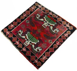 Corner detail of 2000s Shiraz rug showing border pattern and Wool pile