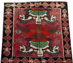 Surface texture of 2000s Shiraz rug with natural Wool and intricate pattern