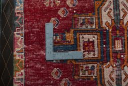 Backside of handmade 2000s Shiraz rug showing knot structure and weave density