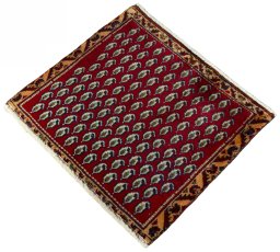Corner detail of 2000s Shiraz rug showing border pattern and Wool pile