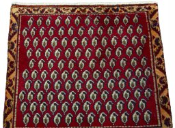 Surface texture of 2000s Shiraz rug with natural Wool and intricate pattern
