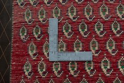 Backside of handmade 2000s Shiraz rug showing knot structure and weave density
