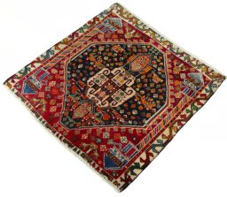Corner detail of 2000s Shiraz rug showing border pattern and Wool pile