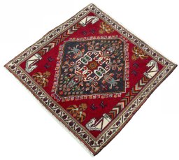 Corner detail of 2000s Shiraz rug showing border pattern and Wool pile