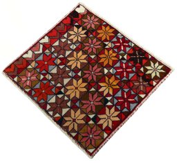 Corner detail of 2000s Shiraz rug showing border pattern and Wool pile