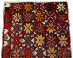 Surface texture of 2000s Shiraz rug with natural Wool and intricate pattern