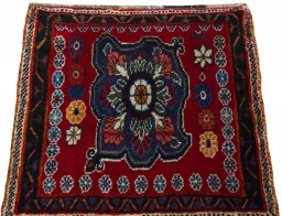 Surface texture of 2000s Shiraz rug with natural Wool and intricate pattern