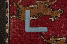 Backside of handmade 2000s Shiraz rug showing knot structure and weave density