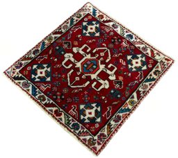 Corner detail of 2000s Shiraz rug showing border pattern and Wool pile