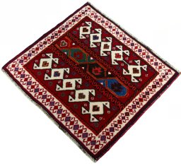 Corner detail of 2000s Shiraz rug showing border pattern and Wool pile