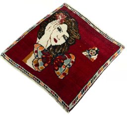 Corner detail of 2000s Shiraz rug showing border pattern and Wool pile
