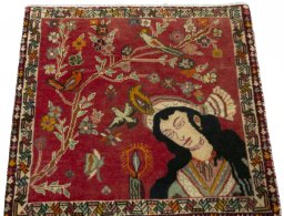 Surface texture of 2000s Shiraz rug with natural Wool and intricate pattern