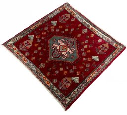 Corner detail of 2000s Shiraz rug showing border pattern and Wool pile
